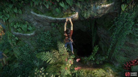 Drop into the hole in the head of the statue