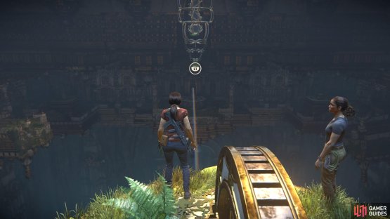 Swing across to the first statue