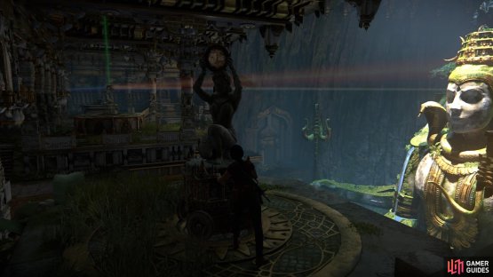 Spin the statues until the mirrors reflect a prism of light