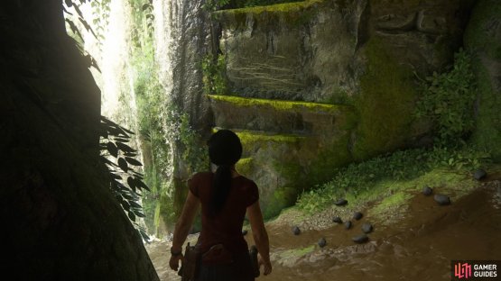 Slide across the slope and jump to the handholds