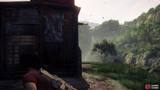 Use the grapple hook points to swing around the train cars