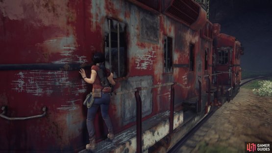 Make your way along the side of the train to the engine room