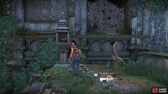 Find the animal statue marker next to the breakable wall