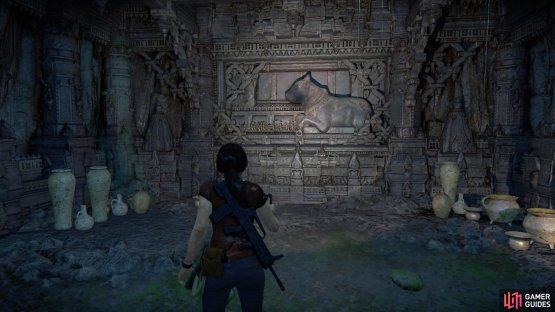 Continue right of the Sala vs. the tiger sculpture