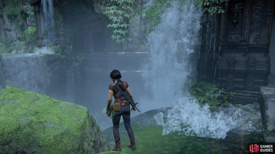 Jump from the ledge to the golden handholds