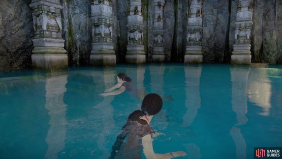 Swim along the pillars on the left side