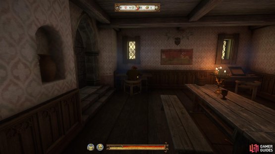 You will find the Bailiff working at his desk.