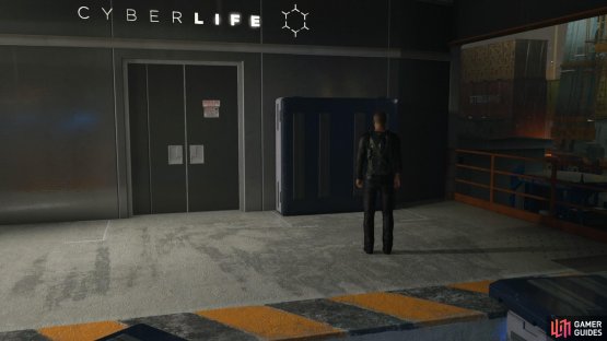 Find the large crate on the upper platform