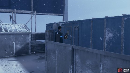 Simon is hiding in a container at the back left side of the roof