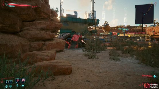 Climb over the pile of cars to enter the area