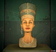 but the counterfeit sculpture has one long earring.
