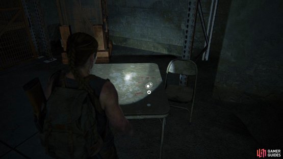 Look to your right when you enter the building to find a Coin on the table