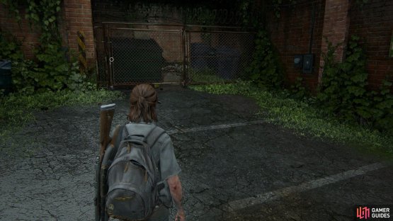 Open the fence on the left to find this bin