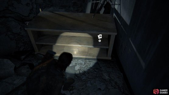 then just before you interact with some pipes, look behind you to find a Trading Card hiding in the shelf.