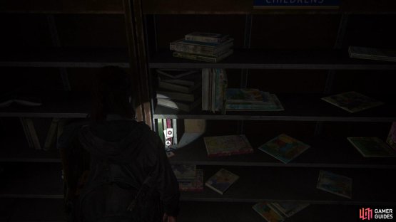 now go into the next building ahead to find a Trading Card on the shelf. 
