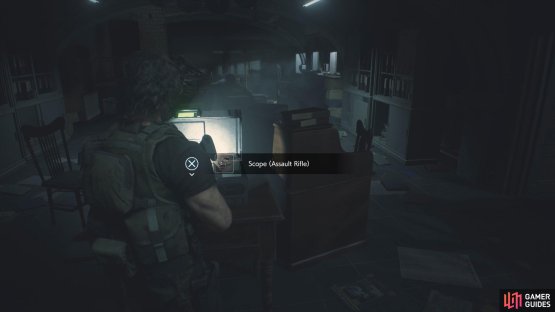 then go back down into the West Office and use ID Card on the case for an attachment for your Assault Rifle.