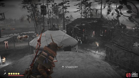 Use the rocks here to survey the camp