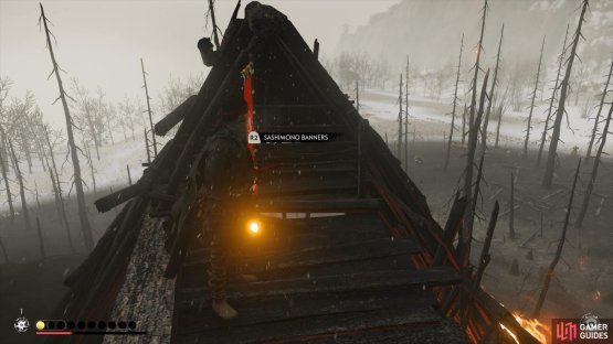 and climb to the top of the burning building to find this banner