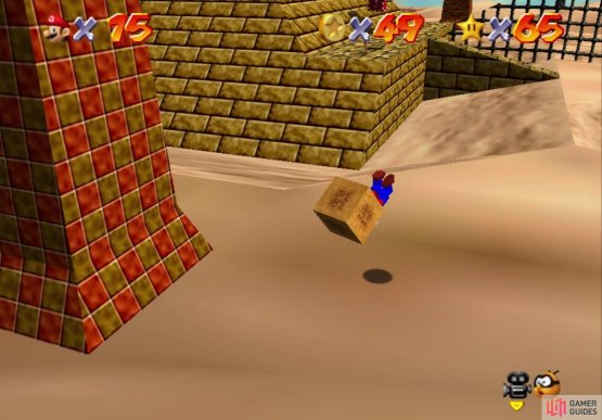 Aim the bouncing box by the pyramid away from the quicksand