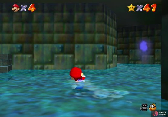 Go around the corner by the blue flame to find the wooden door you need
