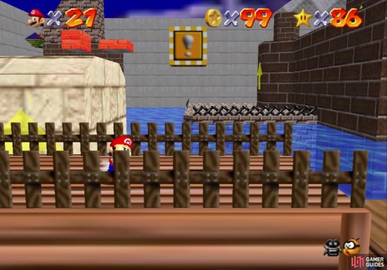 The block on the big wooden platform has three coins