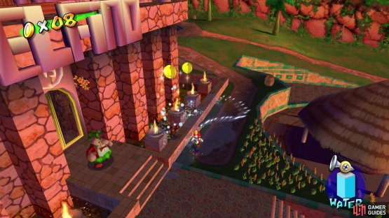 Spray the torches in front of the hotel entrance for some coins