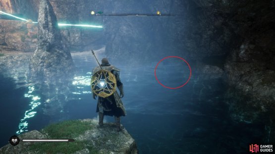 Dive under the water on the left side and swim under the rock to reach the other side.