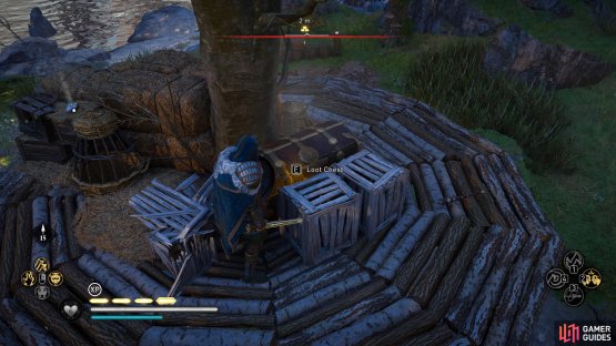 The chest is on top of a platform within the camp.