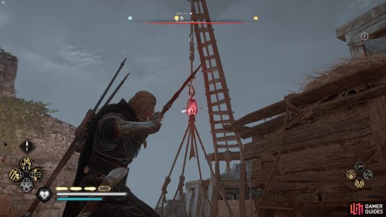 you’ll need to find the crane with the net of stones and shoot it down so you can head into the room below where the book is.