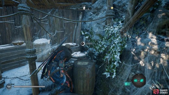 it&rsquo;s resting on a barrel in the camp.