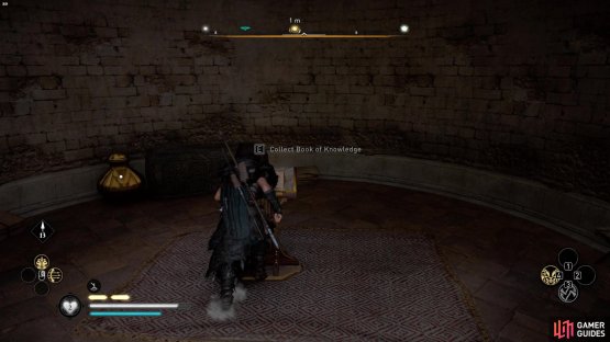 within a locked tower in the south of the settlement.