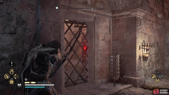 once you&rsquo;ve exploded the stone barricade you&rsquo;ll be able to shoot the door lock through the bars.