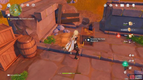 Climb up the ruined structure to find the Fatui Research laying on top of a crate.