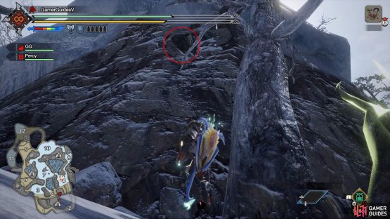 It can be hard to see, but you want to climb up to this cave.