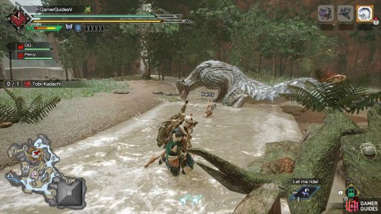 Tobi looks sideways, its head near the ground.