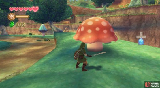 Poke the mushrooms the Kikwi is hiding behind to scare it out of hiding.