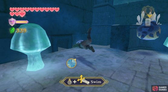 In the eastern room, swim towards this gap.