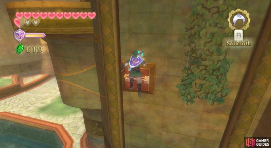 With enough momentum, you should reach the wall switch, although barely.