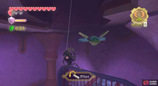 Knock down the furthest Skulltula to flip over the lilypad.