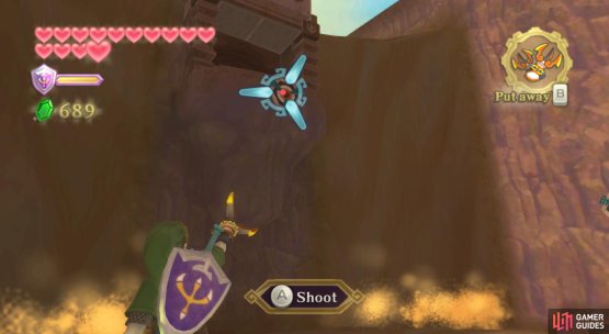 Make your way to the west and use the Clawshots to reach this high-up ledge