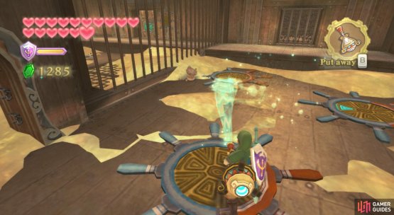Blow away the sand to find clues to open the locked door.