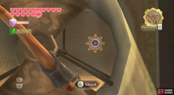 While in the present version of the Sandship, fire an arrow through the non-moving fan.