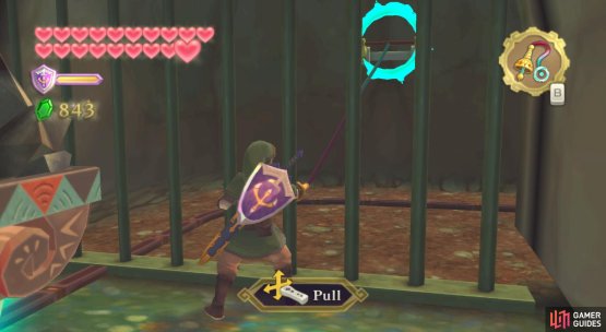 When the mine cart stops, use your Whip to pull the lever on the other side.