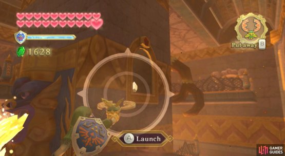 Also, grab the Silver Rupee, worth 100 rupees, in the nearby alcove.