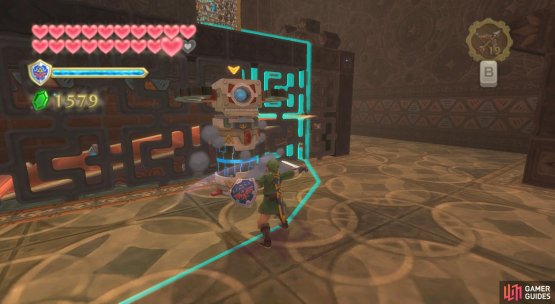 In the next room, focus on eliminating the Beamos alongside the belt.