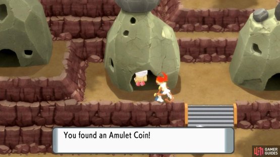The Amulet Coin is inside one of the rock houses