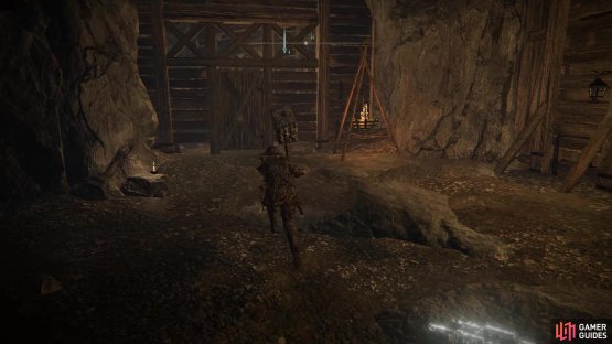 Head to the end of the path to open the door