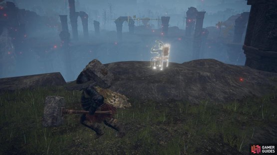 he is next to a broken column on the cliff edge.