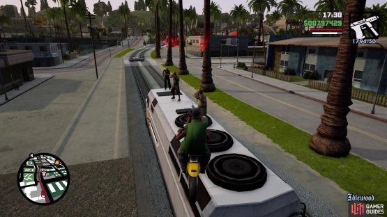 You can jump onto the train with the Vagos from the previously mentioned building