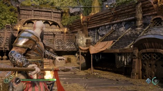 Throw the Draupnir Spear into this point in the wall to create a handhold for you to climb up.
